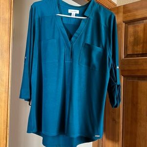 Beautiful teal top! Never worn.